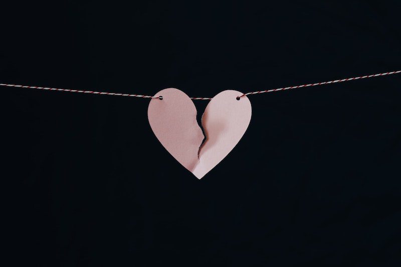 black background with broken heart